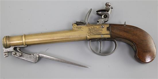 A Belgian brass framed and brass cannon barrelled flintlock boxlock overcoat pistol, 10.5in (14.5in with bayonet)